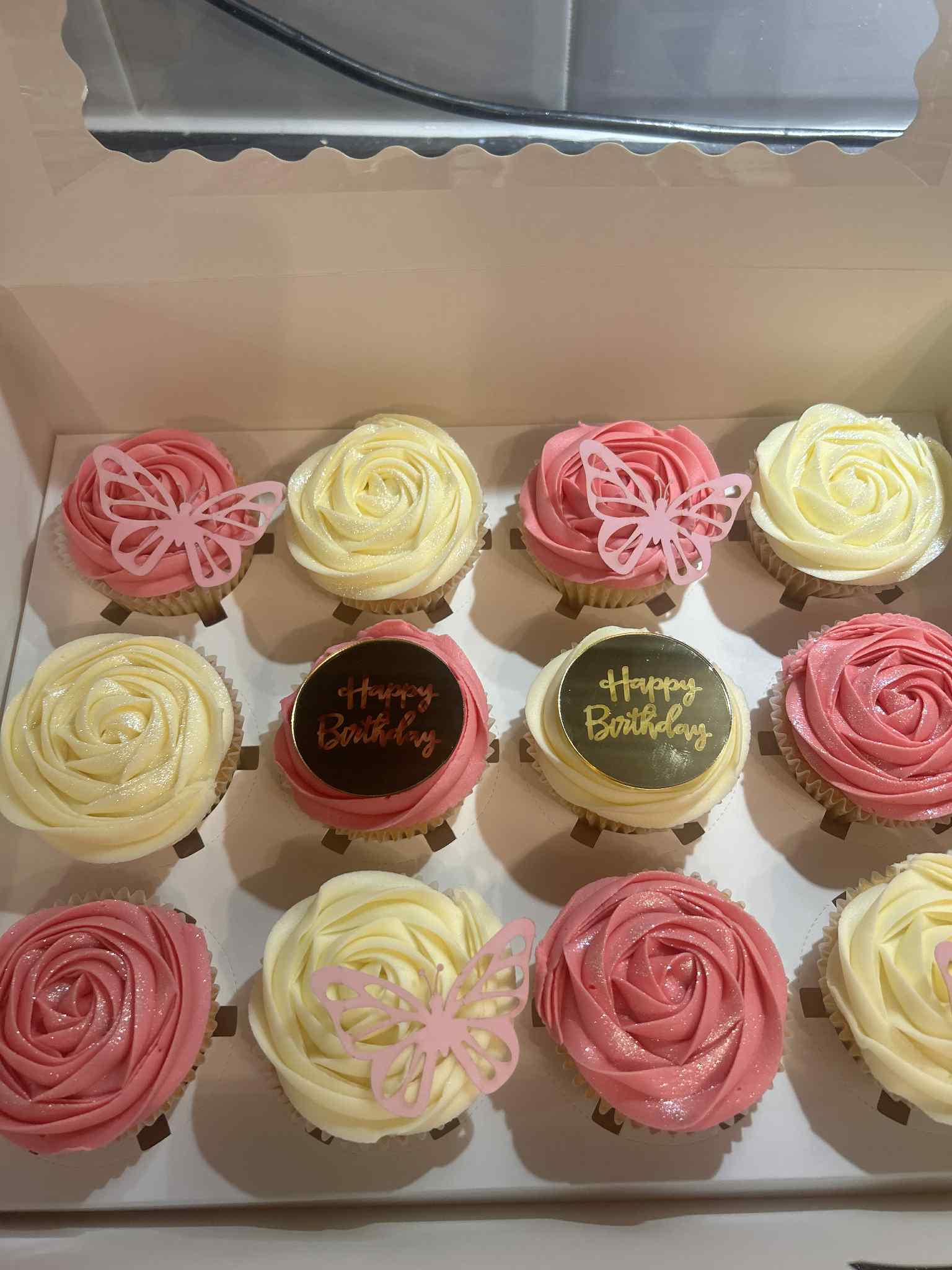 Cupcakes with a butterfly and sparkle theme